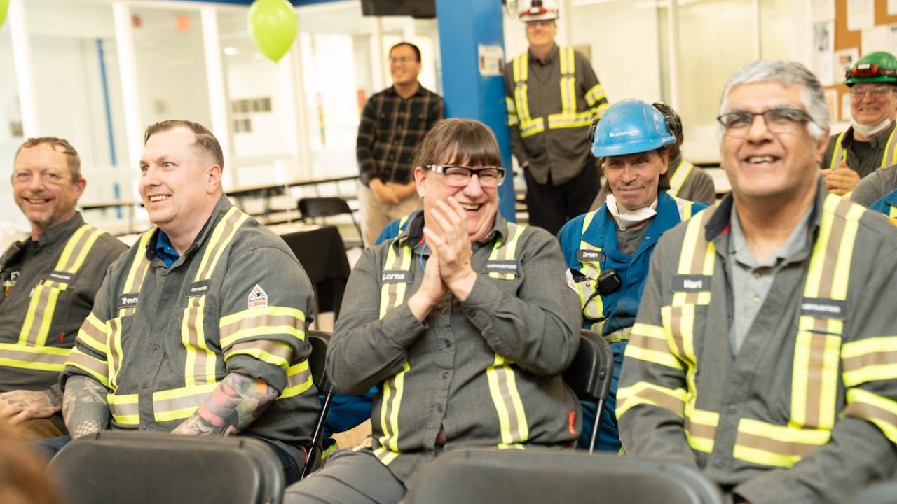 Employees at a meeting at Saint-Gobain Canada.