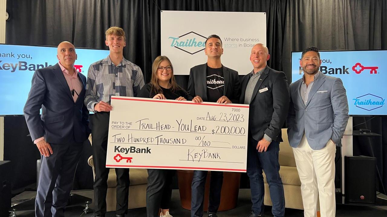 Group of people holding a cheque awarded from Keybank