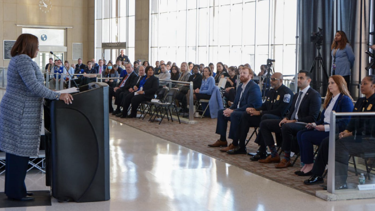A person stood in front of an audience 