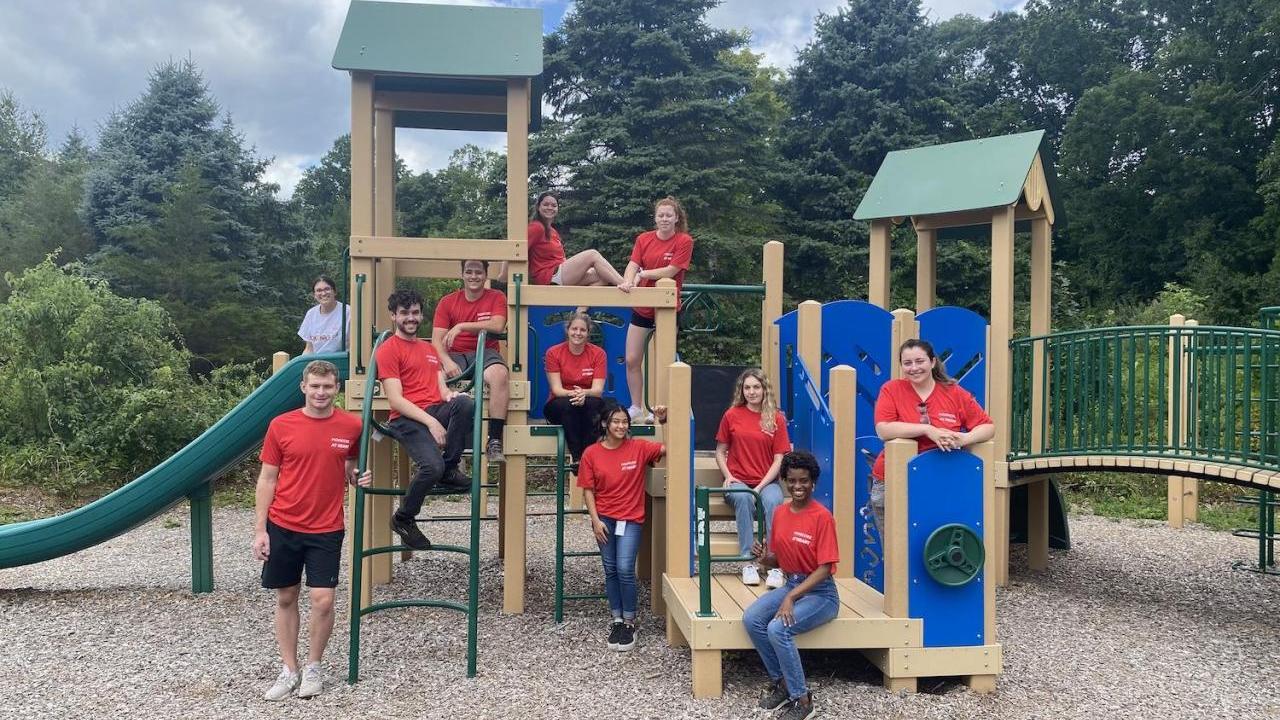 Trumbull Nature and Arts Center nonprofit team on playground