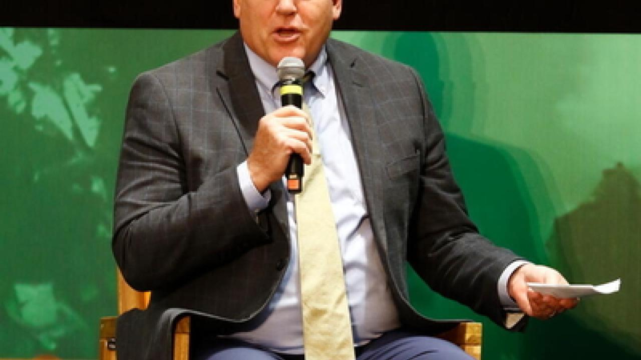 Dan Lambe, CEO of the Arbor Day Foundation, speaks on stage during the First International Green Cities Conference at FAO's headquarters in Rome, Italy. 
