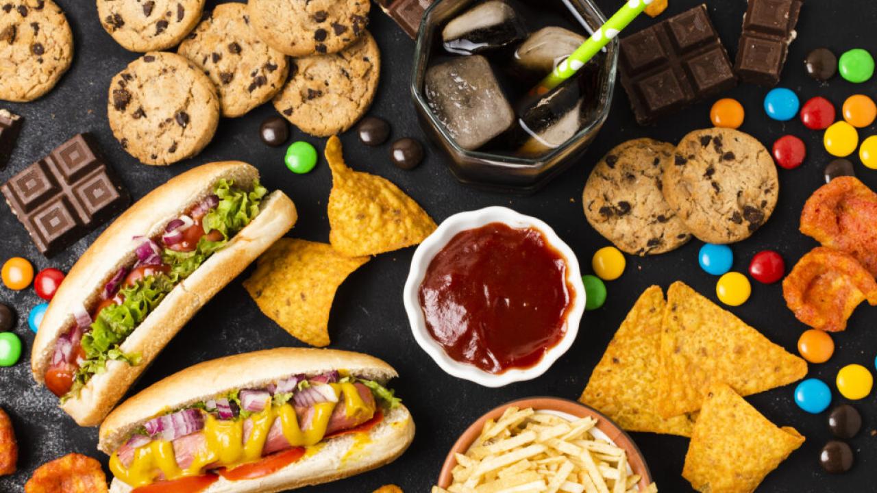 Image showing processed foods: cookies, hot dogs, candy, cheese and cookies.
