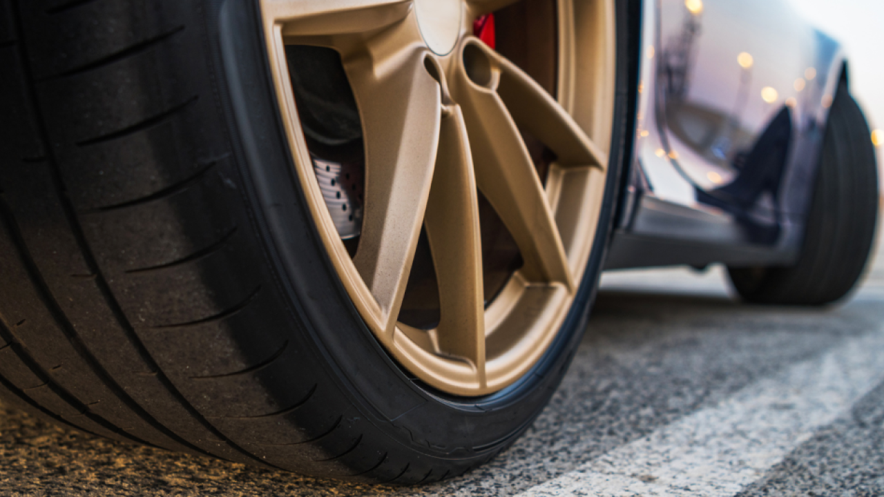 View from under a vehicle of its tire