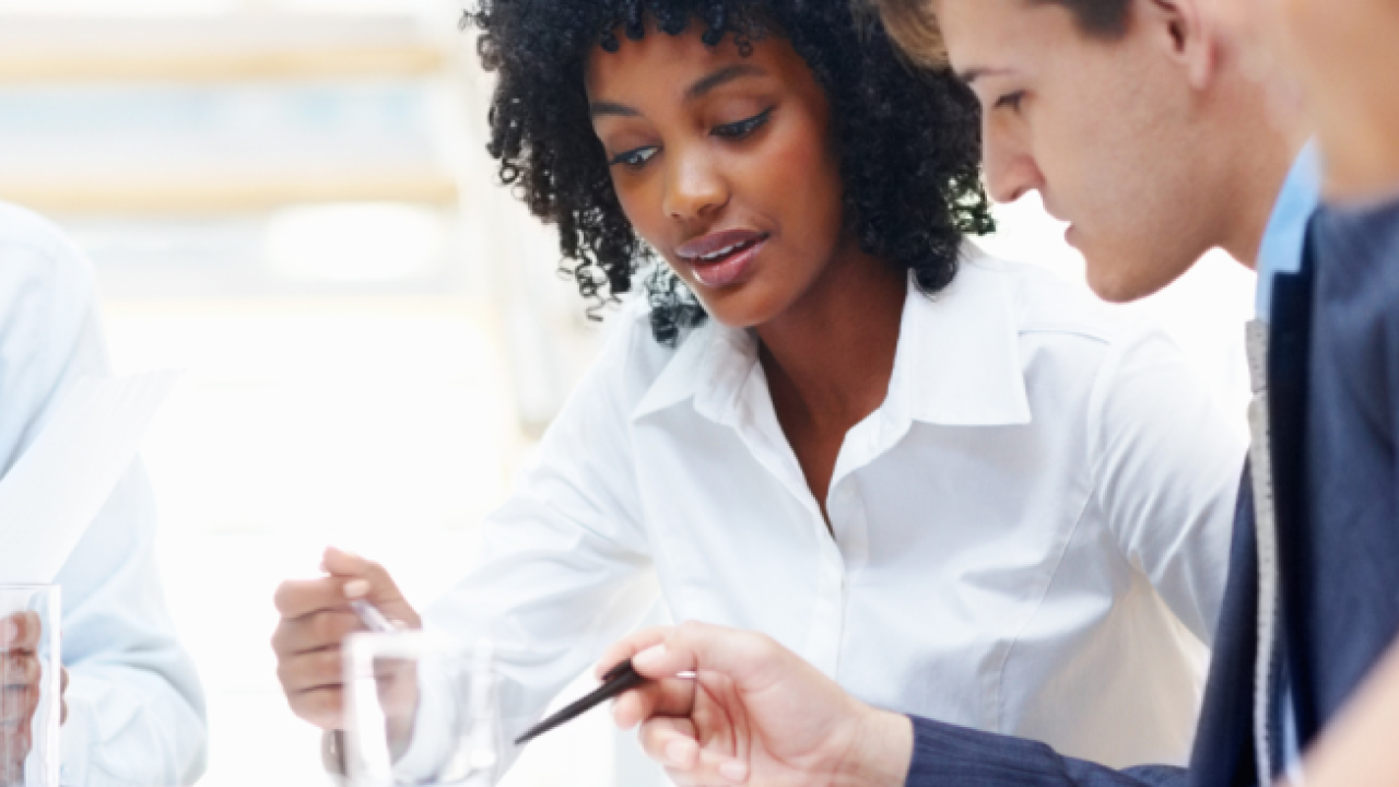 Five professionals collaborating