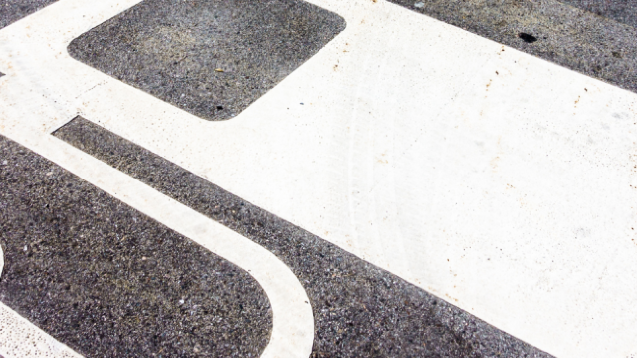 EV charge station logo on pavement
