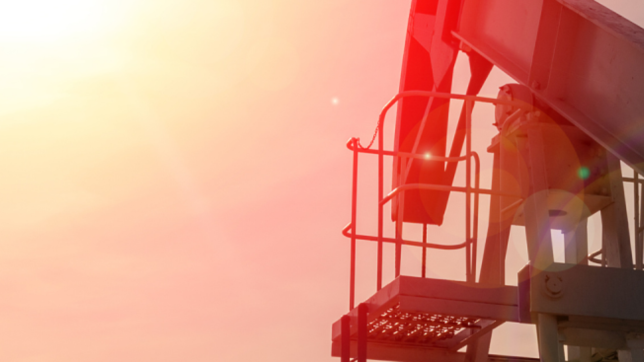 Oil rig at sunset