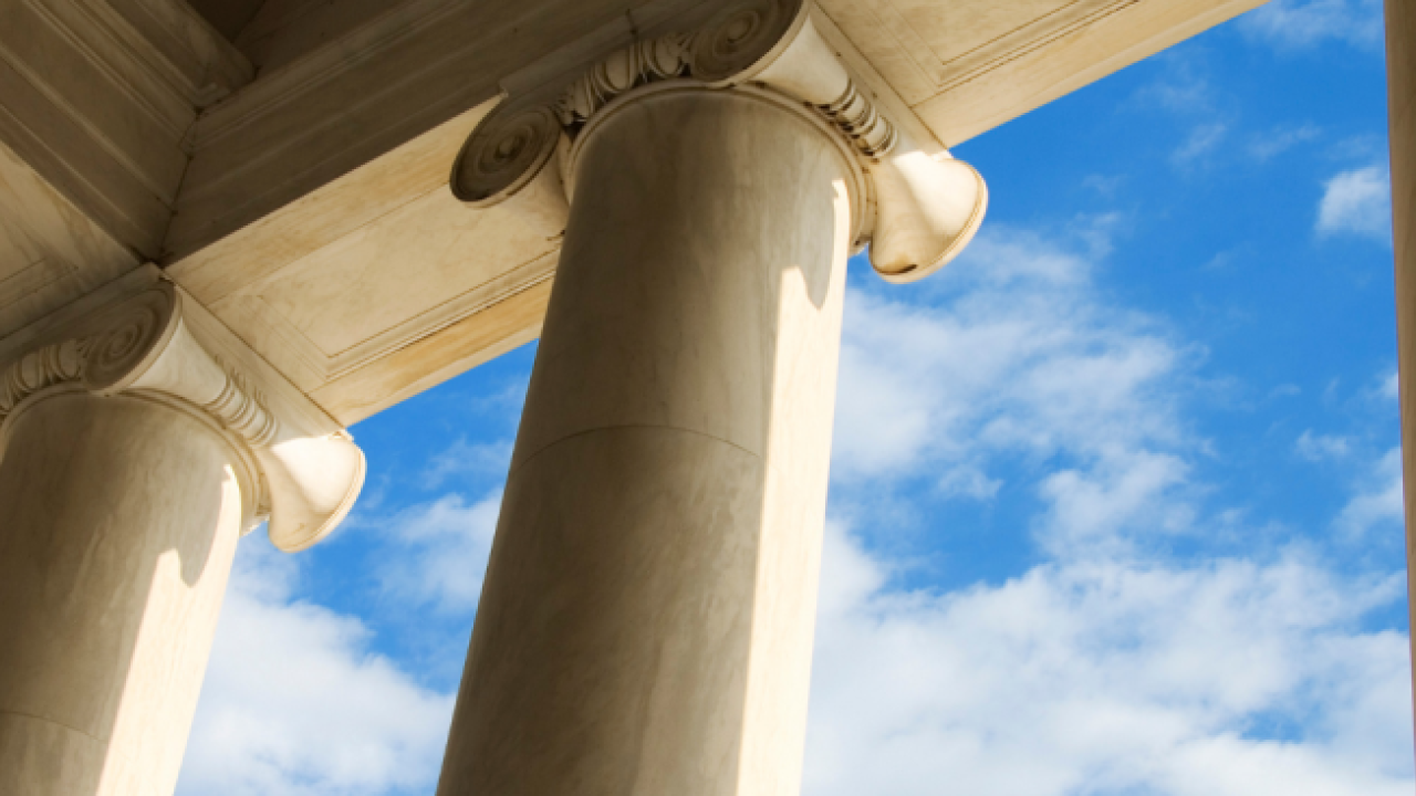 pillars against a blue sky