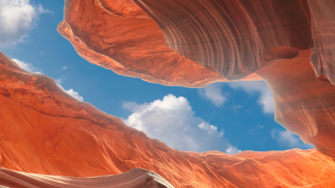 canyons, seen from below with blue sky overhead