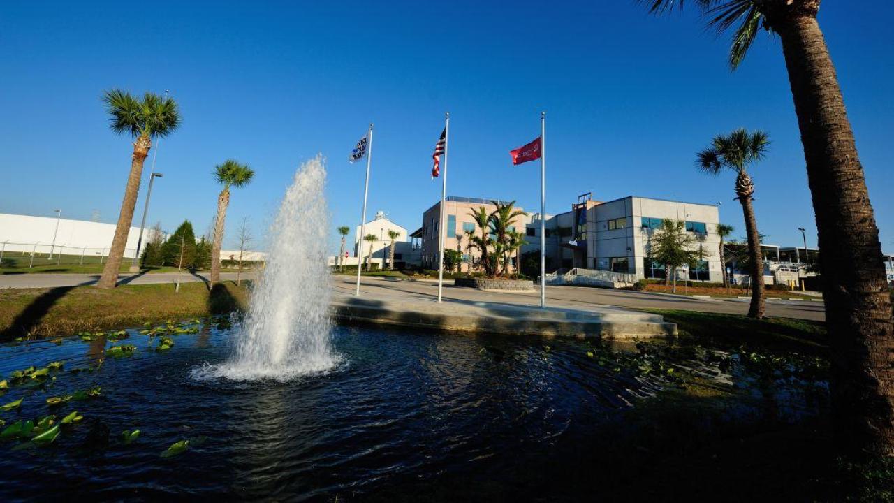 Fountain of water in front of building 