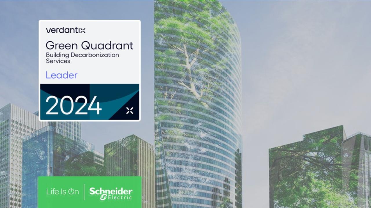 Tall building with the text "verdantix Green Quadrant Building Decarbonization Services Leader 2024"