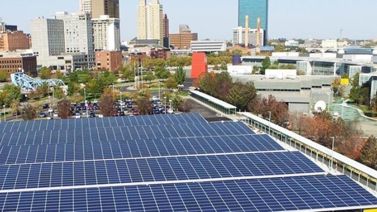 Solar panels with a city background