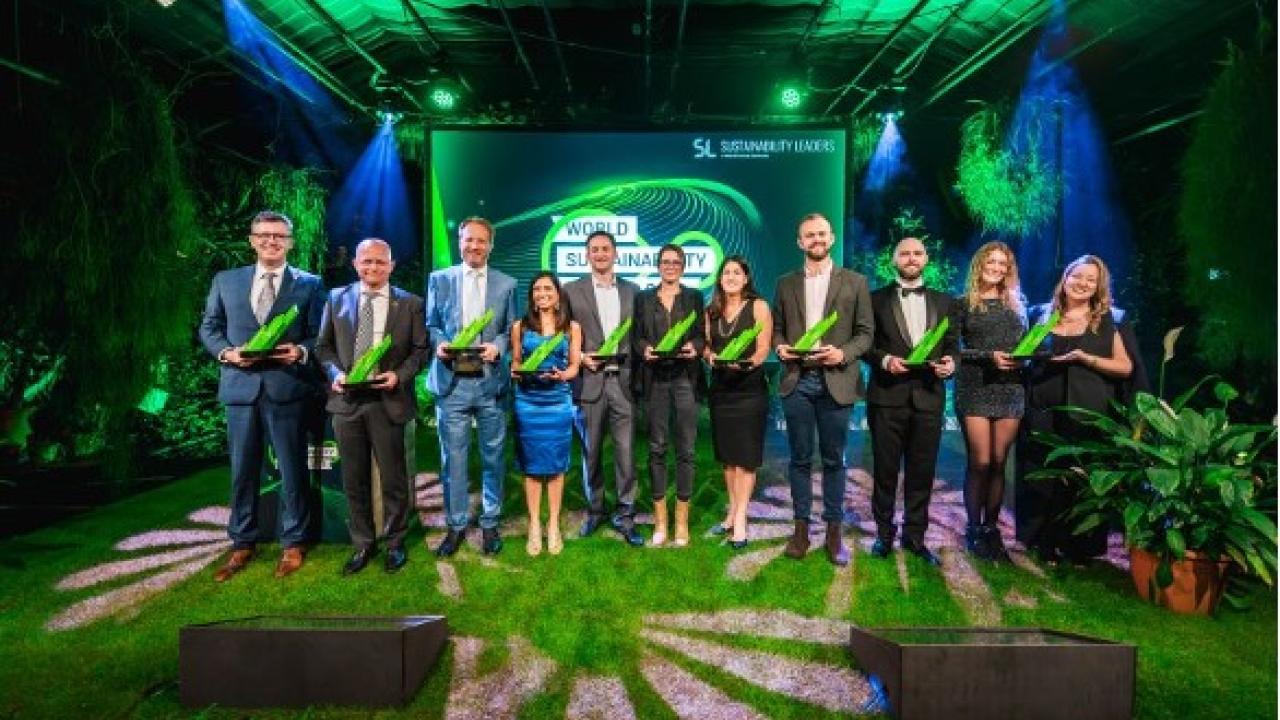 Merck KGaA, Darmstadt, Germany, employee Shaun Russell (third from right) accepts the Sustainability Excellence Award for the company at the World Sustainability Congress in The Netherlands.