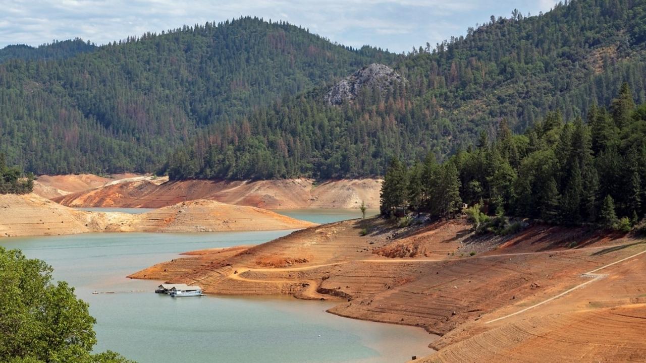 river shoreline within mountains