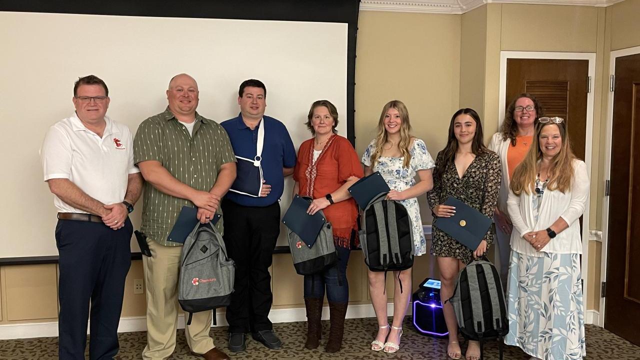 Scholarship recipients and employees.