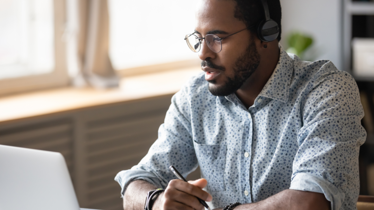 Man in front of laptop