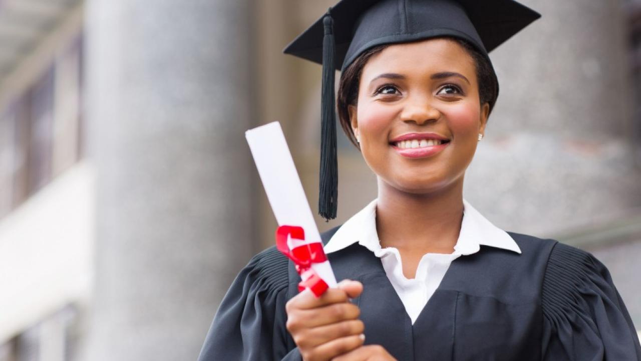 person holding a diploma