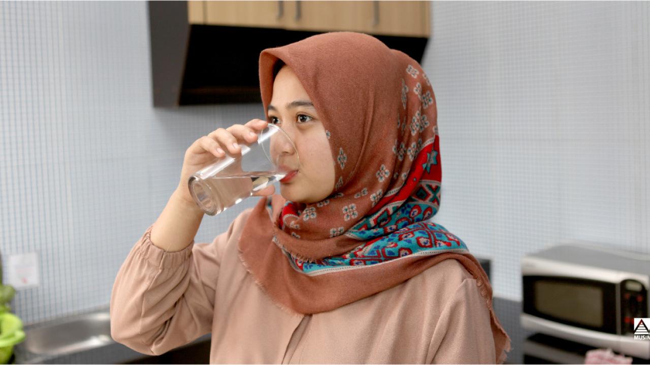 girl drinking water