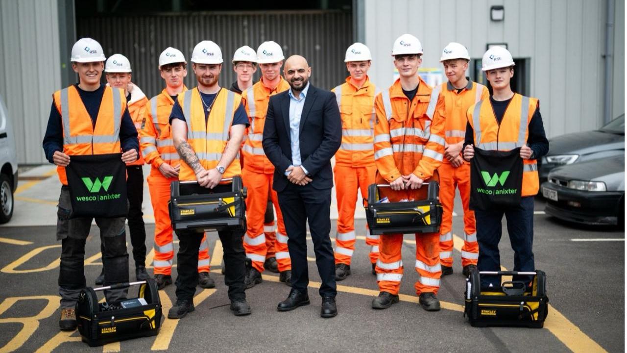 Picture: Zubi Hussain, Wesco Business Development Manager EES UK and new RSE apprentice cohort with their toolkits 
