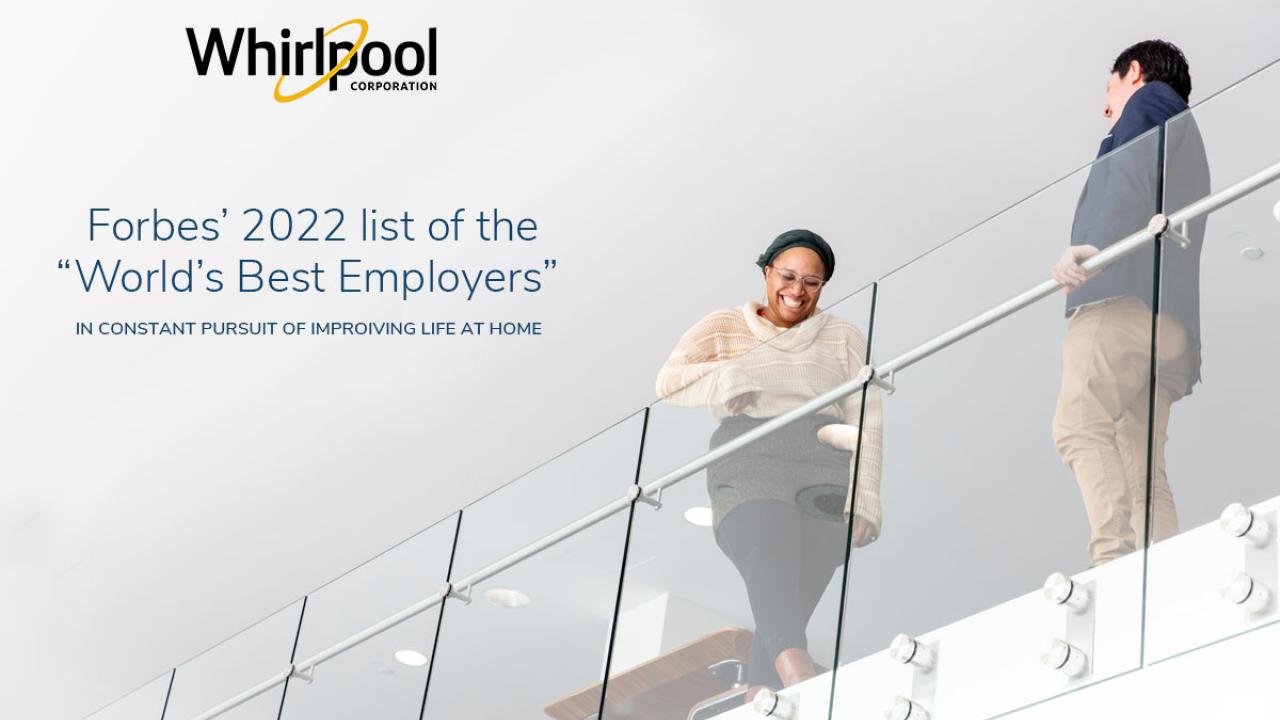 people near a glass wall - Forbes’ 2022 list of the “World’s Best Employers”