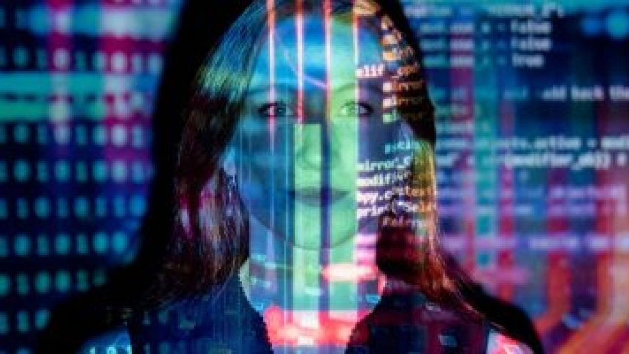 A person stood in front of a protector screen