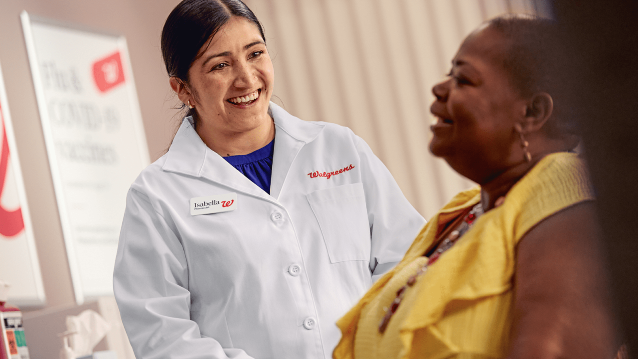 A young pharmacist seeing a patient 