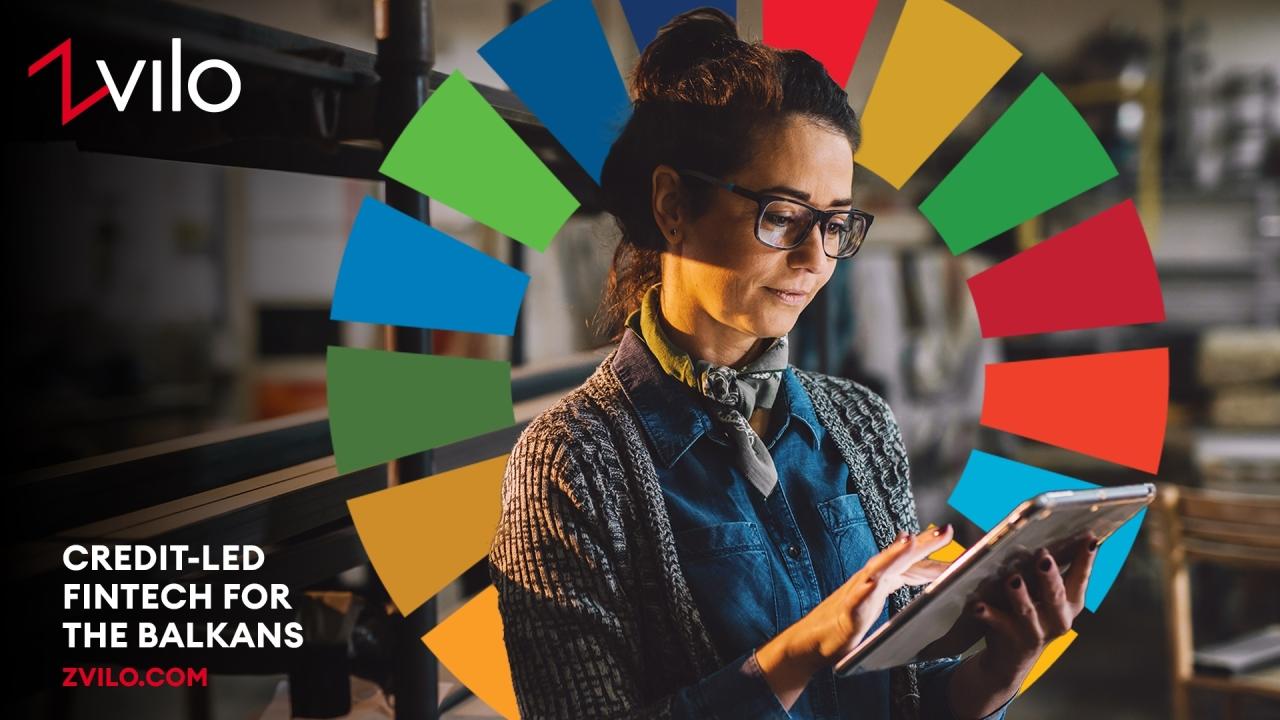 Person using tablet with SDGs logo in background