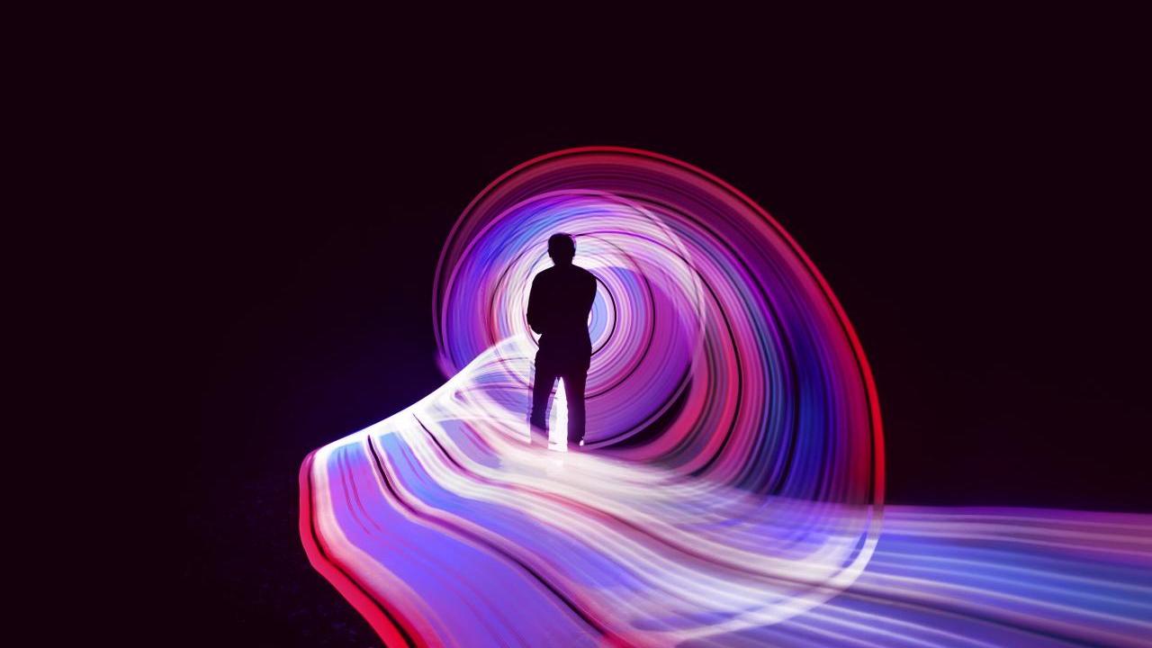 person looking at luminous light