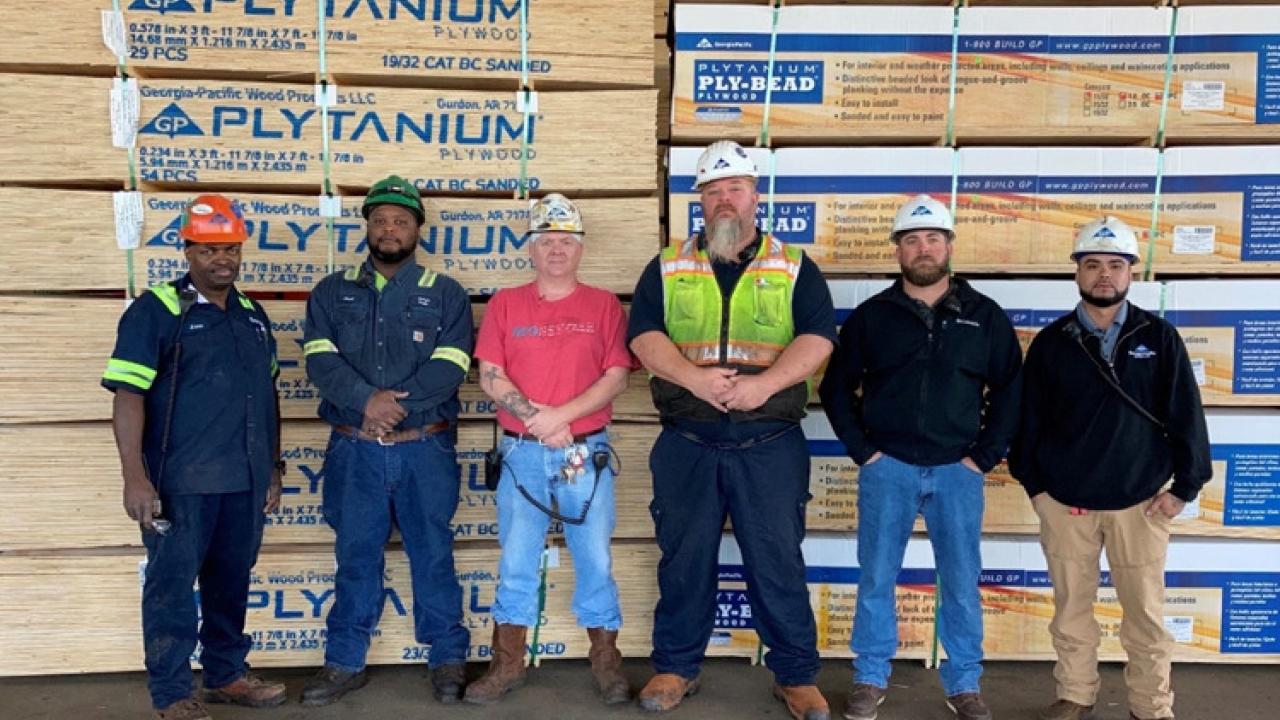 6 employees in hardhats