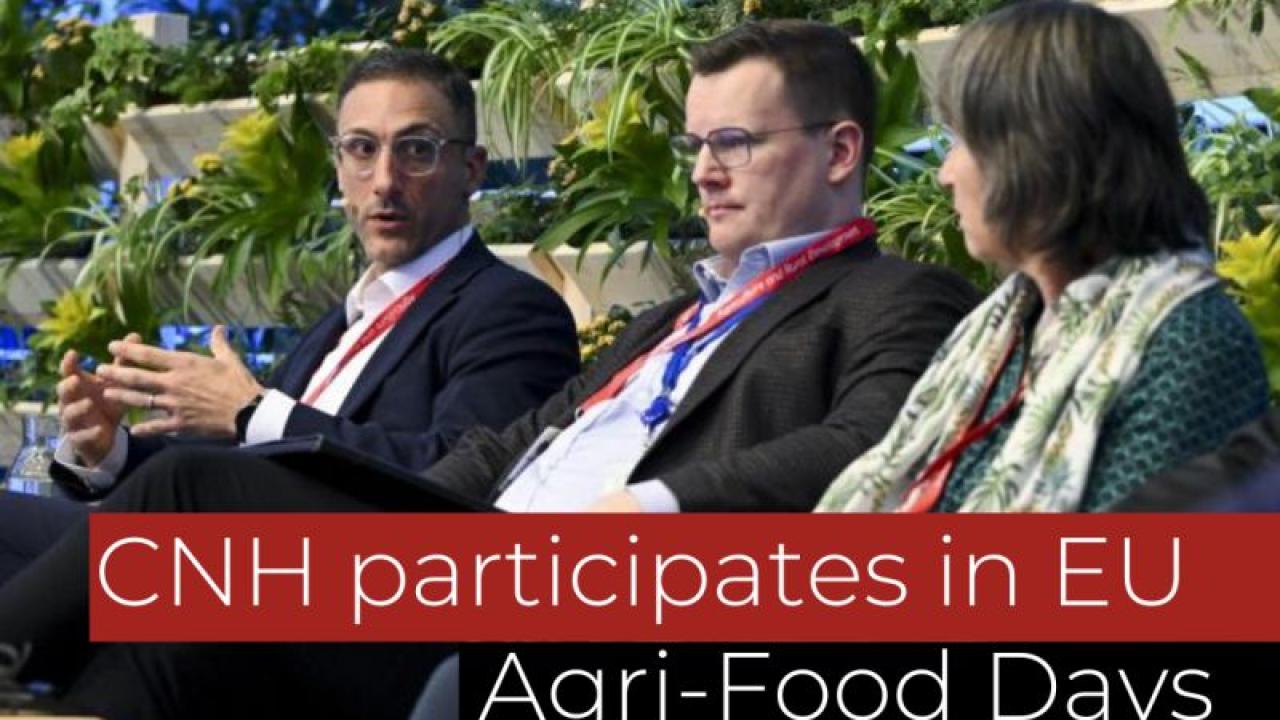 Three people seated on a stage "CNH participates in EU Agri-Food Days"