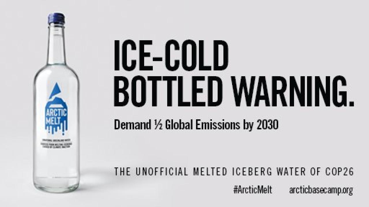 bottle of water with text: "Ice-Cold Bottled Warning Demand 1/2 Global Emissions by 2030 The Unofficial Melted Iceberg Water of COP26"