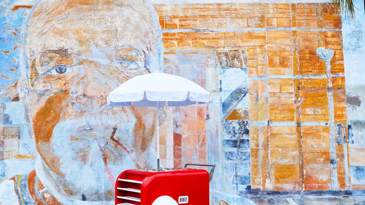 artwork on building behind food truck