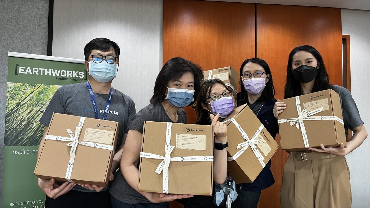 people holding award boxes