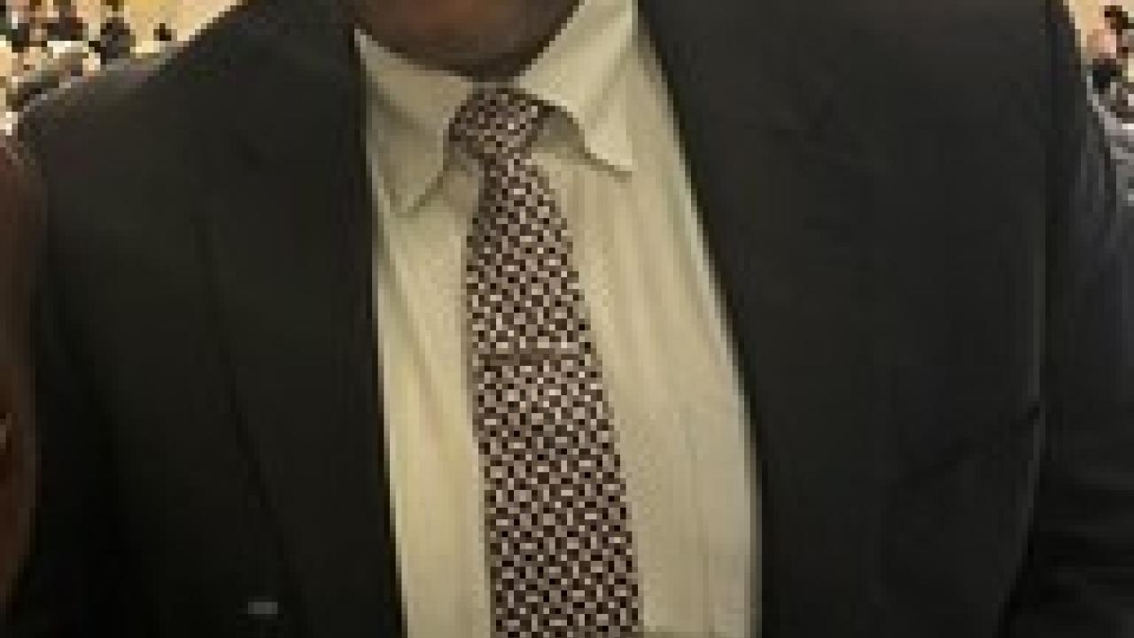 Kyle Pierce holding his award from the Houston Business Journal's 2023 Head of Diversity Awards