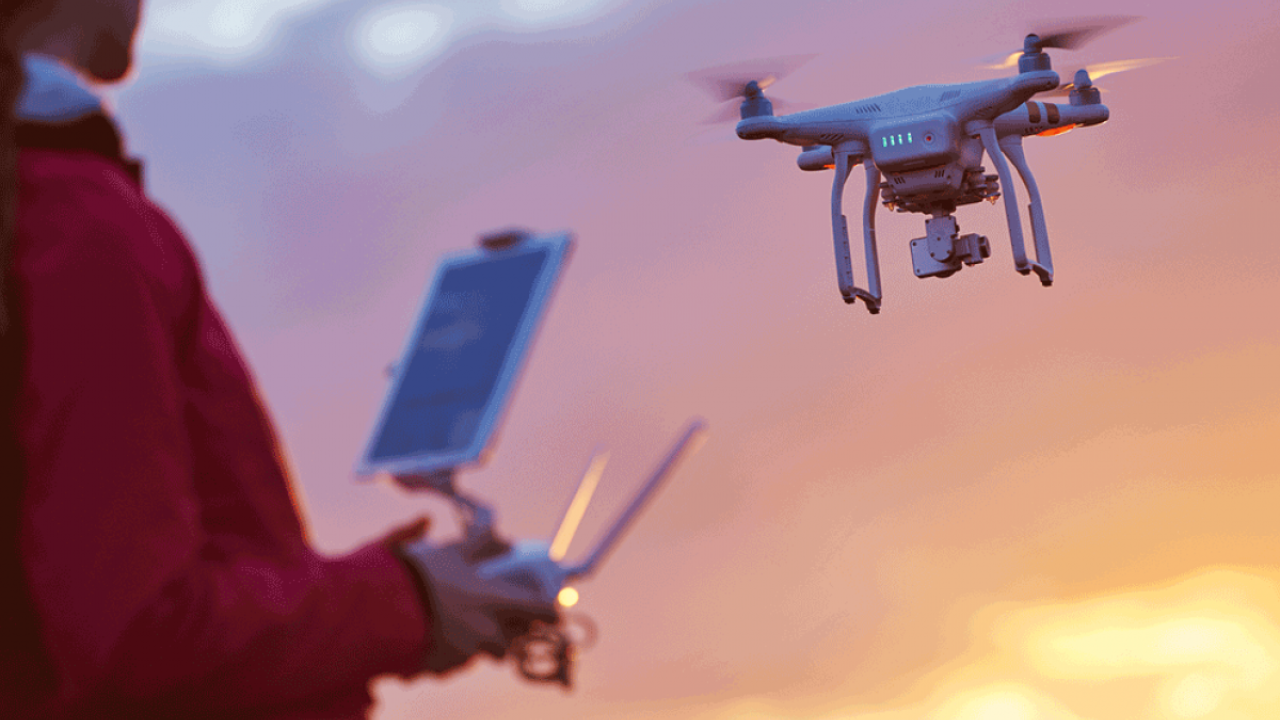 Flying a drone at sunset