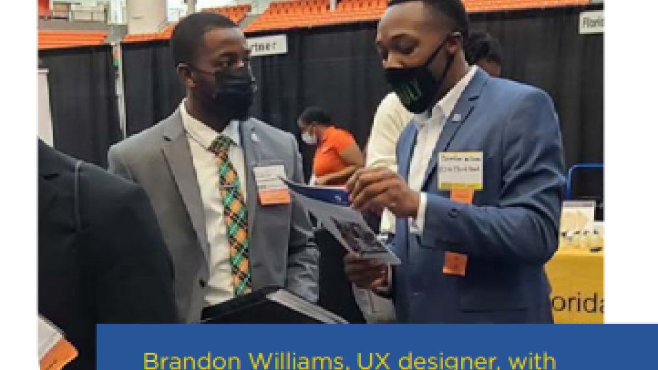 Photo with text: Brandon Williams, UX designer, with a collegiate participant at the FAMU Spring 2022 Fair. 