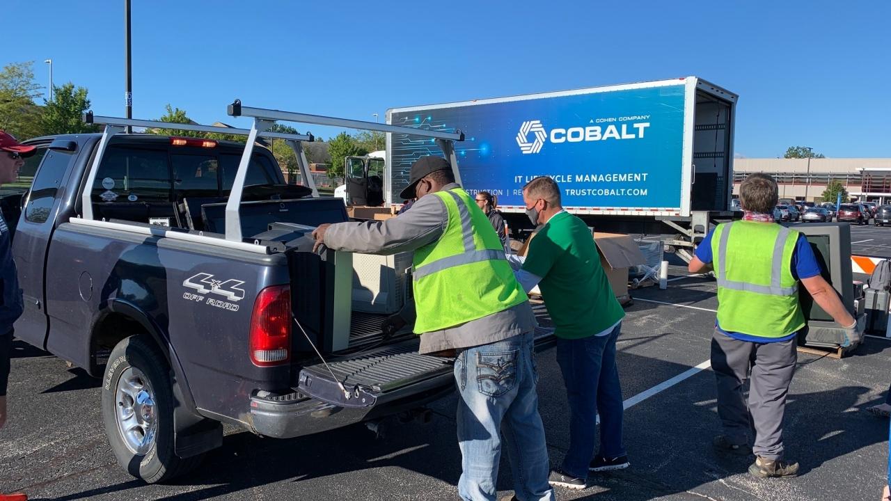 people loading a truck