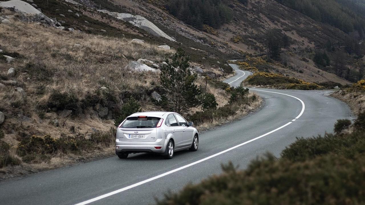 car driving down the road
