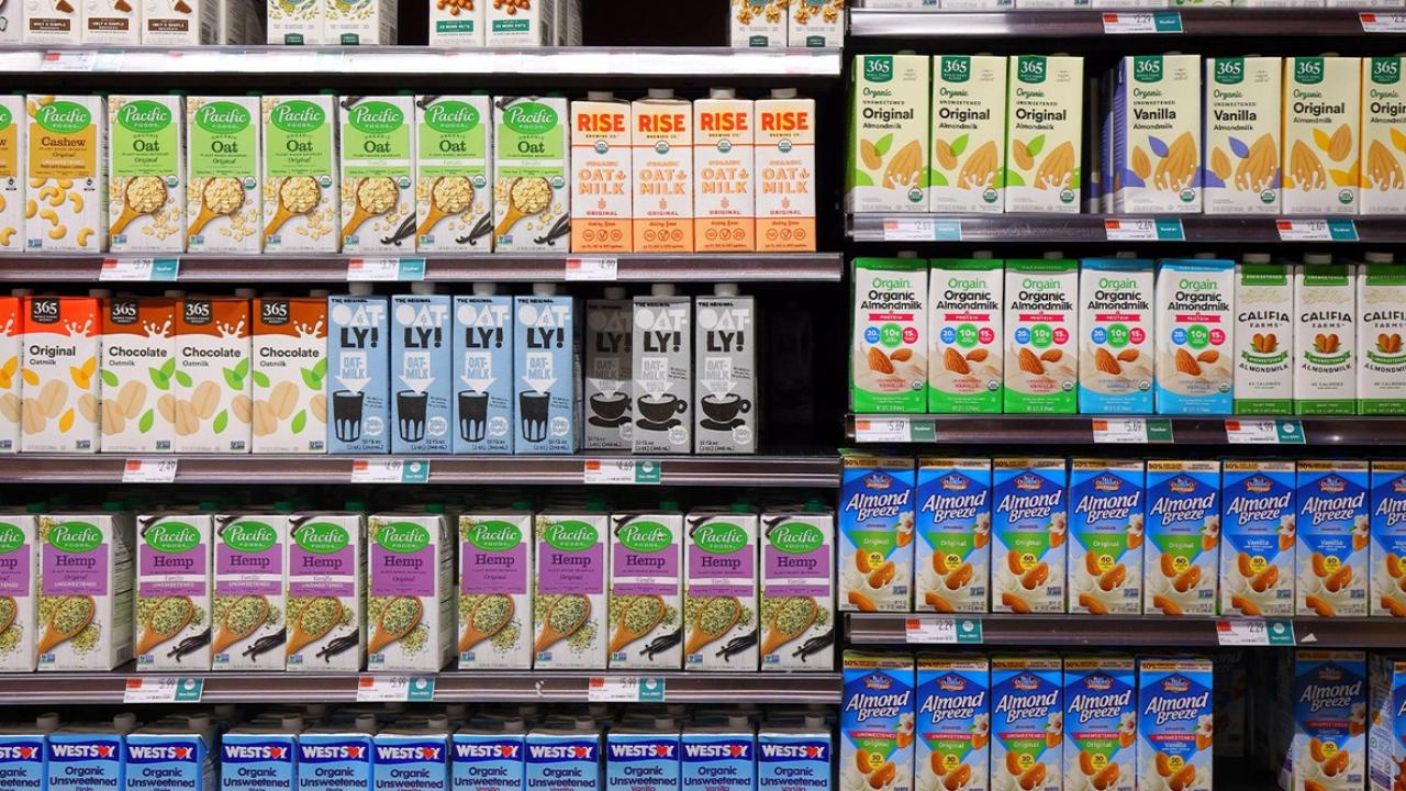 Shelves of different cartons of food and drink items.