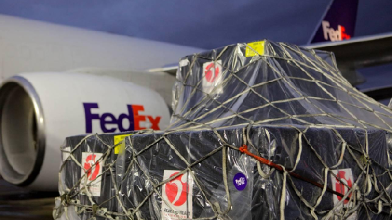 A large package outside a FedEx airplane