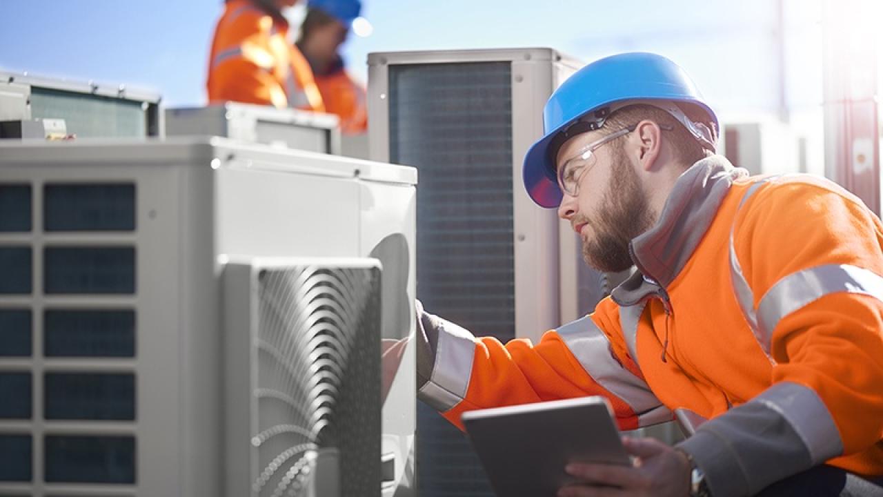 Chemours employee working on an HVAC system