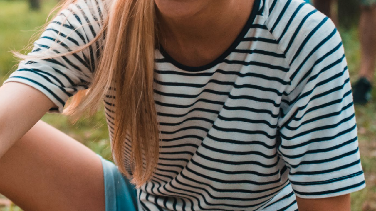 employee volunteering at a cleanup