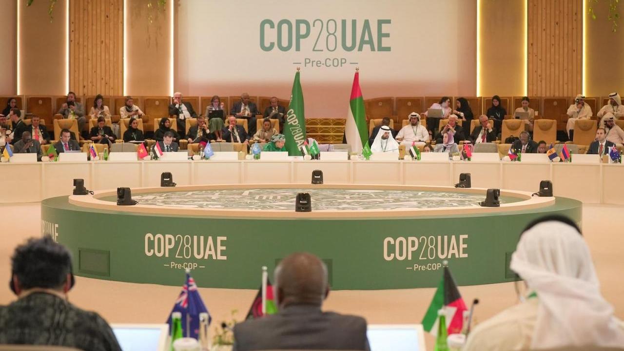 People seated at COP28 talks