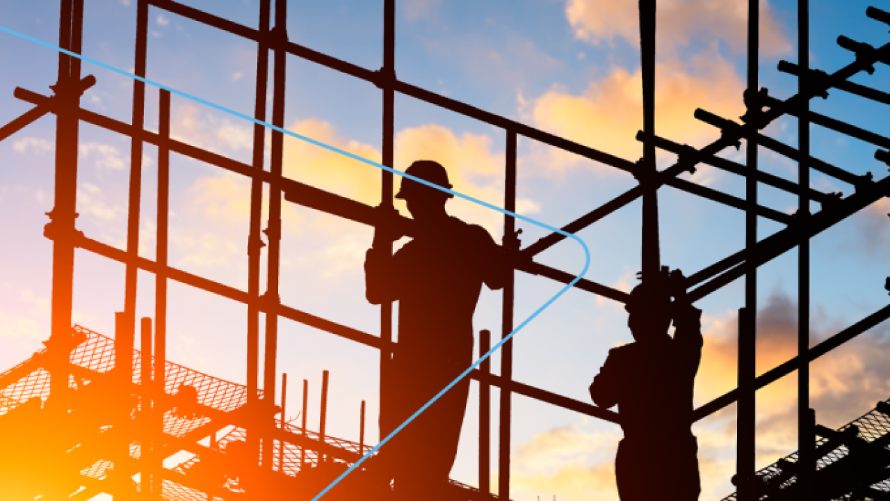 construction workers at dusk
