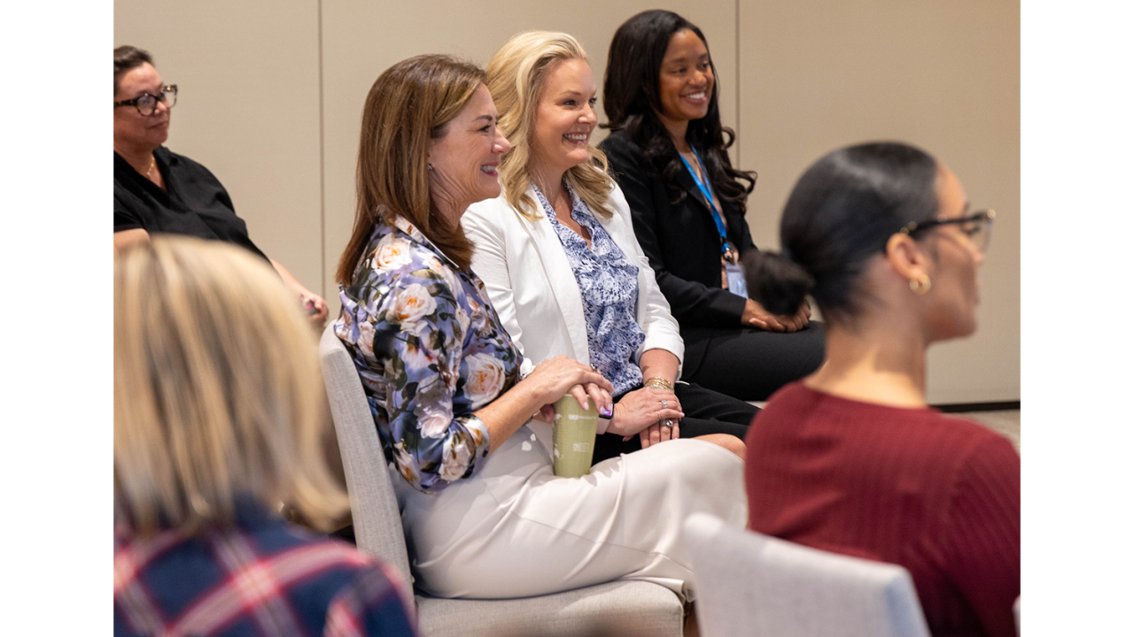 Women seated at an event