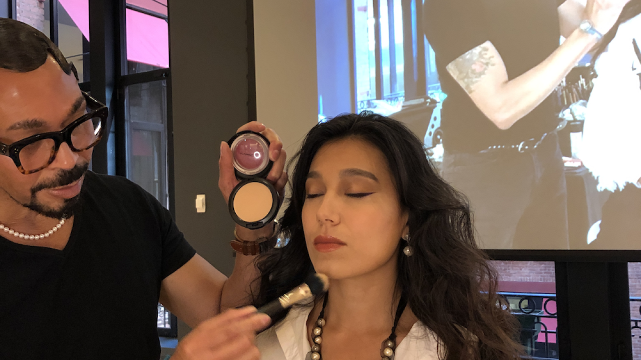 person getting makeup applied