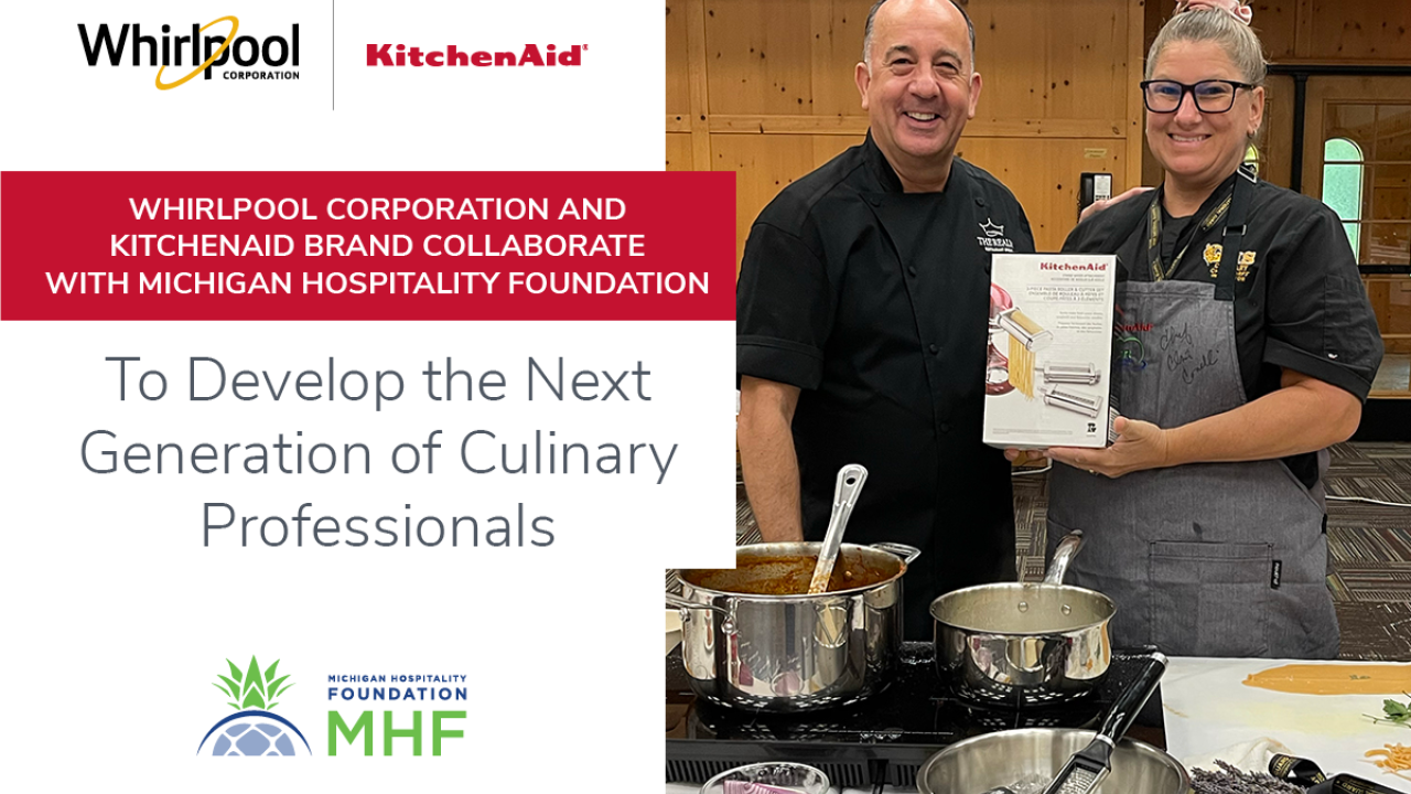Two people standing behind a stove with pots of food. One holds a box for a kitchen aid pasta maker. "To Develop the next generation of culinary professionals. MHF and Whirlpool logos.