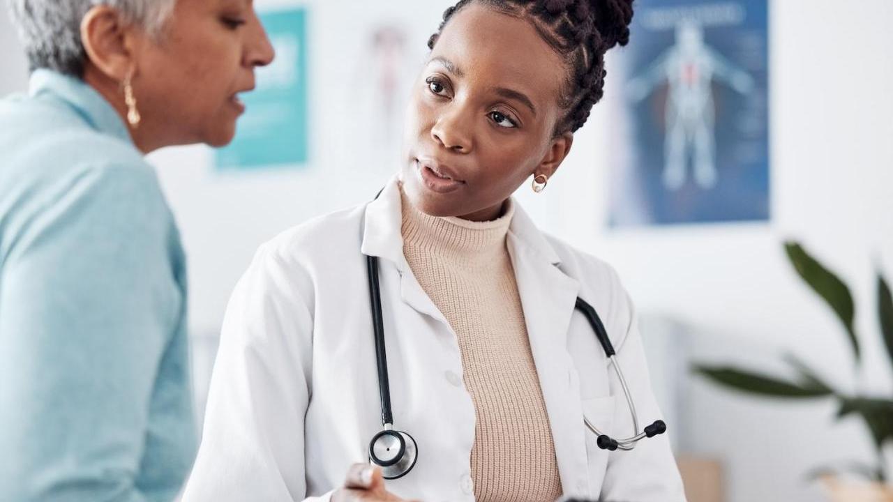 doctor talking to patient