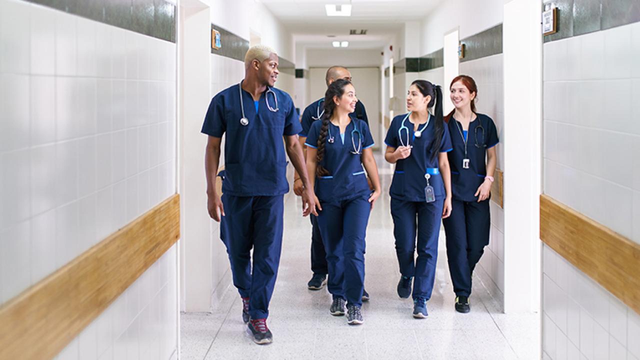 doctors walking down a hallway