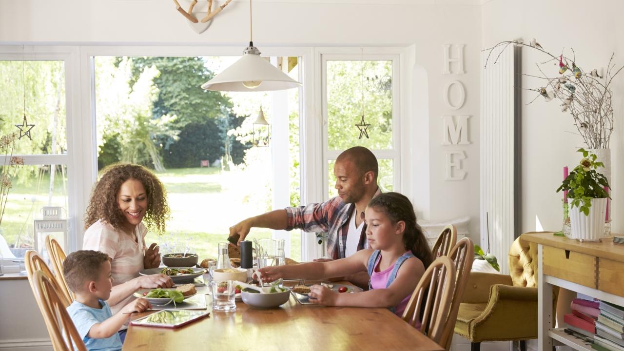 A family enjoying a meal in dinning room