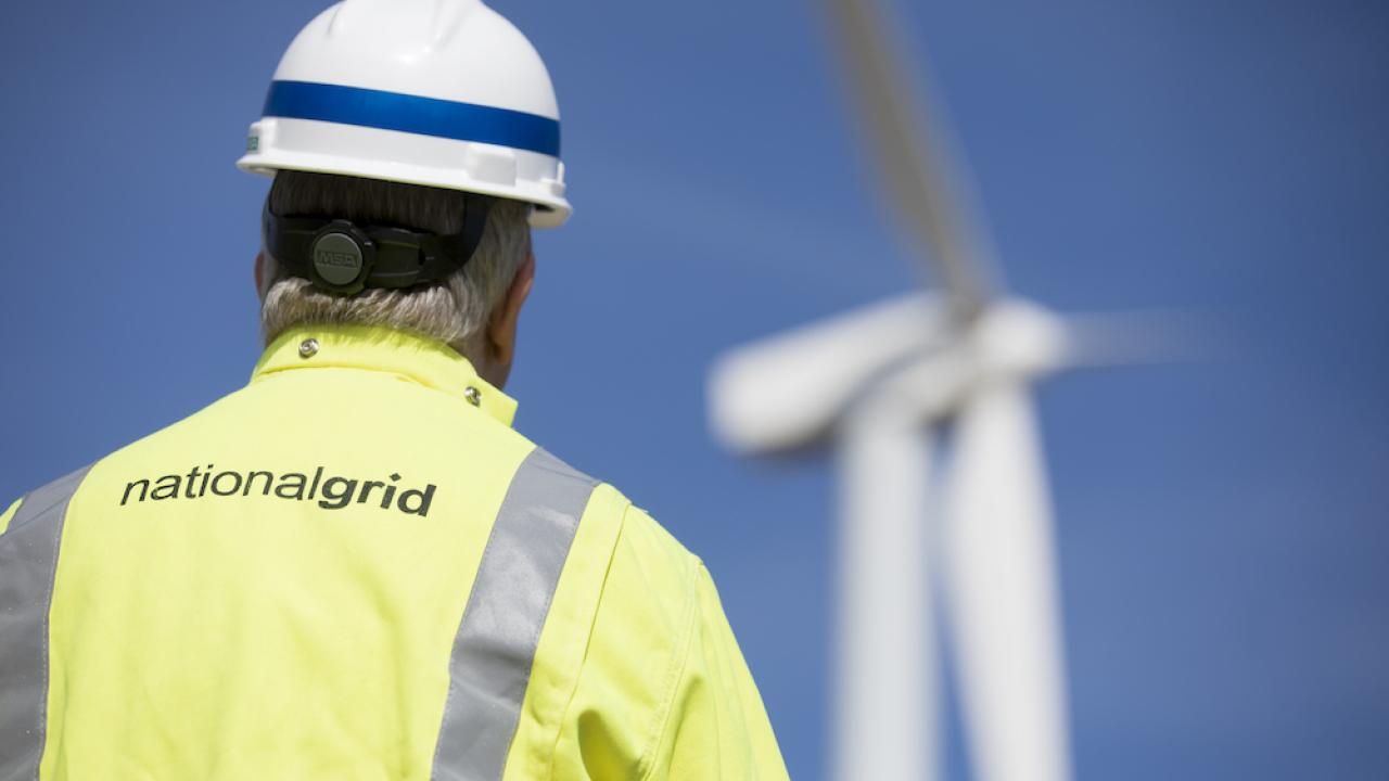National Grid worker and wind turbine